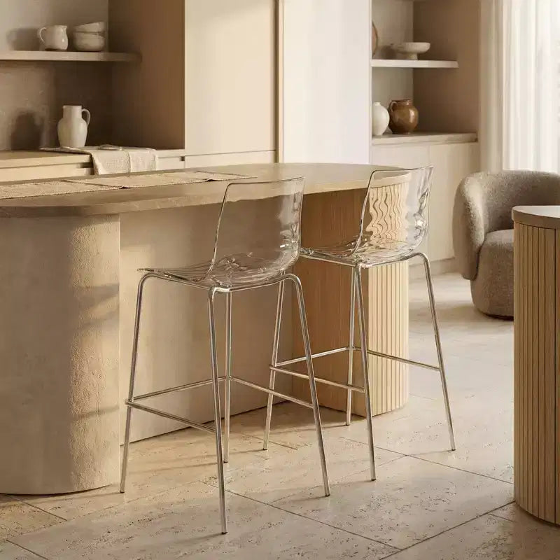 Tabouret de bar moderne en plastique avec assise ondulée et repose-pieds